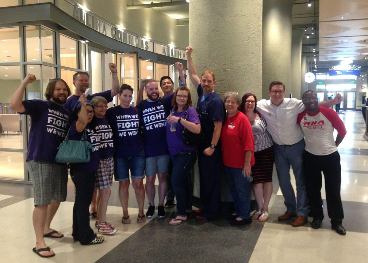 SEIU Healthcare Minnesota and MNA members cheer after SEIU members delivered a letter to Allina Health headquarters. Workday Minnesota photo