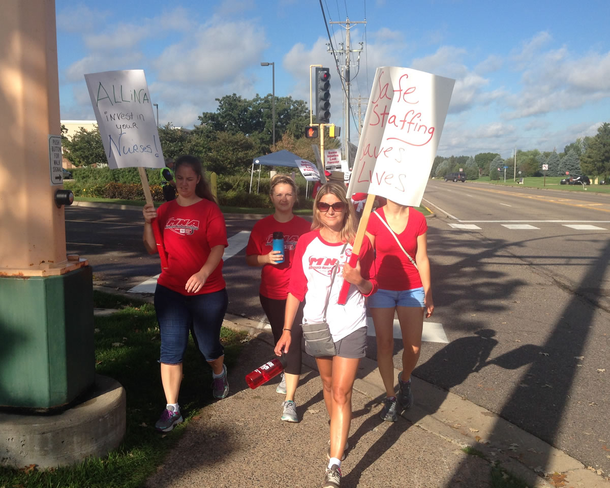 Nurses walked the picket line early Monday morning at Unity Hospital in Fridley. Workday Minnesota photo