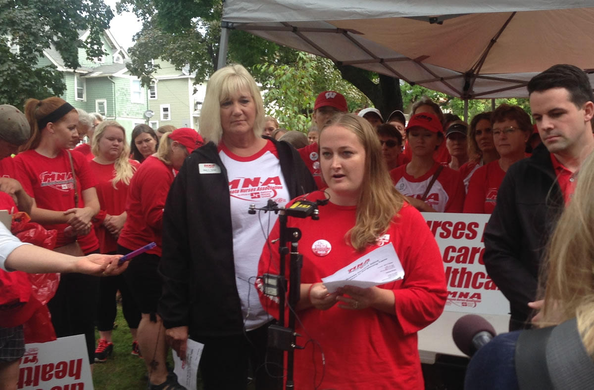 Flanked by MNA President Mary Turner, Registered Nurse Angela Becchetti addressed reporters Monday. Workday Minnesota photo