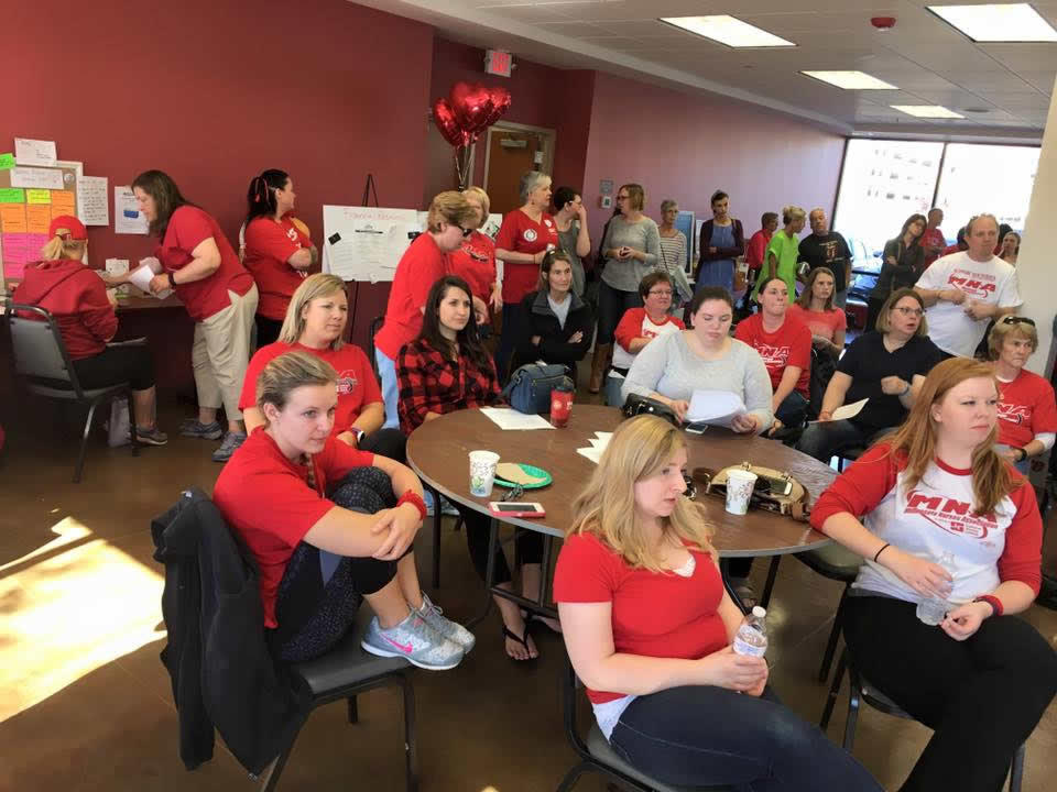 Members of the Minnesota Nurses Association discussed the latest proposal from Allina Health prior to Monday's vote. Photo courtesy of MNA