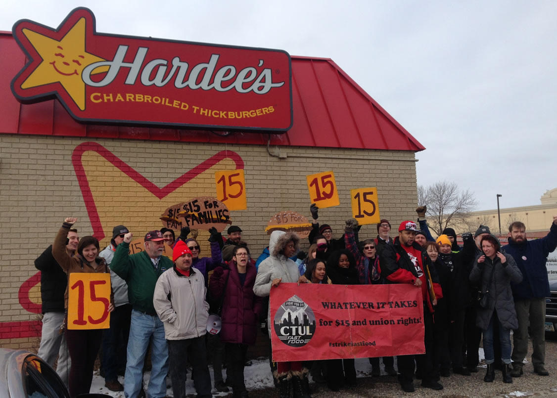Demonstrators cheered after holding a rally against the nomination of Andrew Puzder, the CEO of the company that owns Hardee's and Carl's Jr. restaurants, for U.S. Secretary of Labor. Workday Minnesota photo