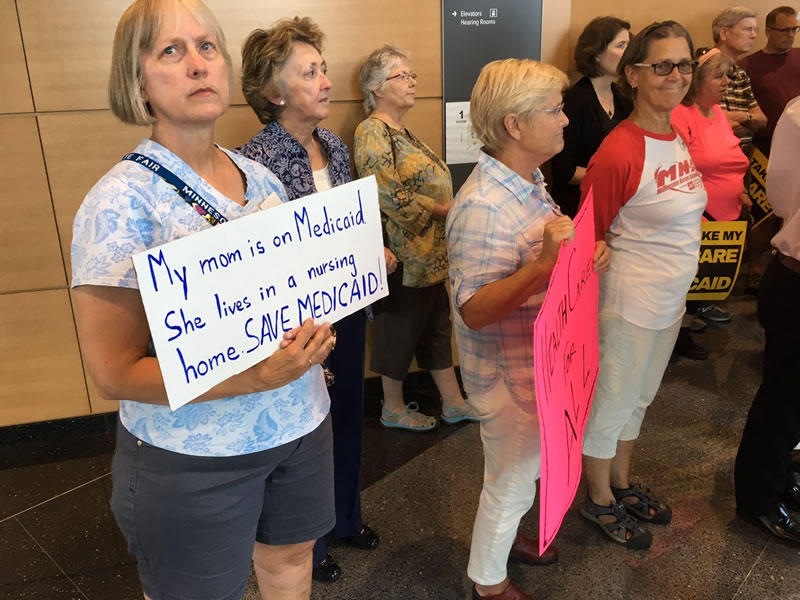 Citizens took part in a news conference at the state Capitol to share concerns about threats to health care. Photo courtesy of ISAIAH via Twitter