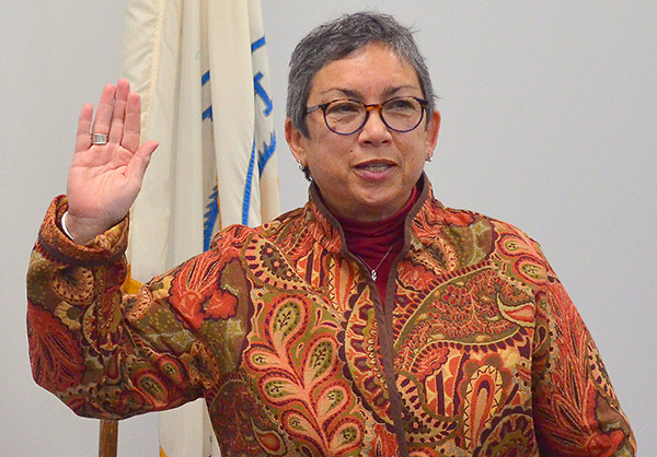 Minnesota AFL-CIO President Bernie Burnham takes the oath of office. Photo by Michael Moore, St. Paul Union Advocate.