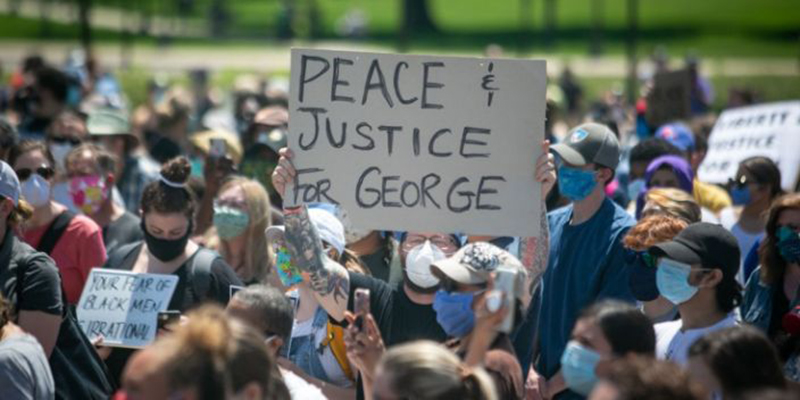 Thousands of protesters gather at the Minnesota State Capitol to demand justice for George Floyd. (Jason Armond / Los Angeles Times)